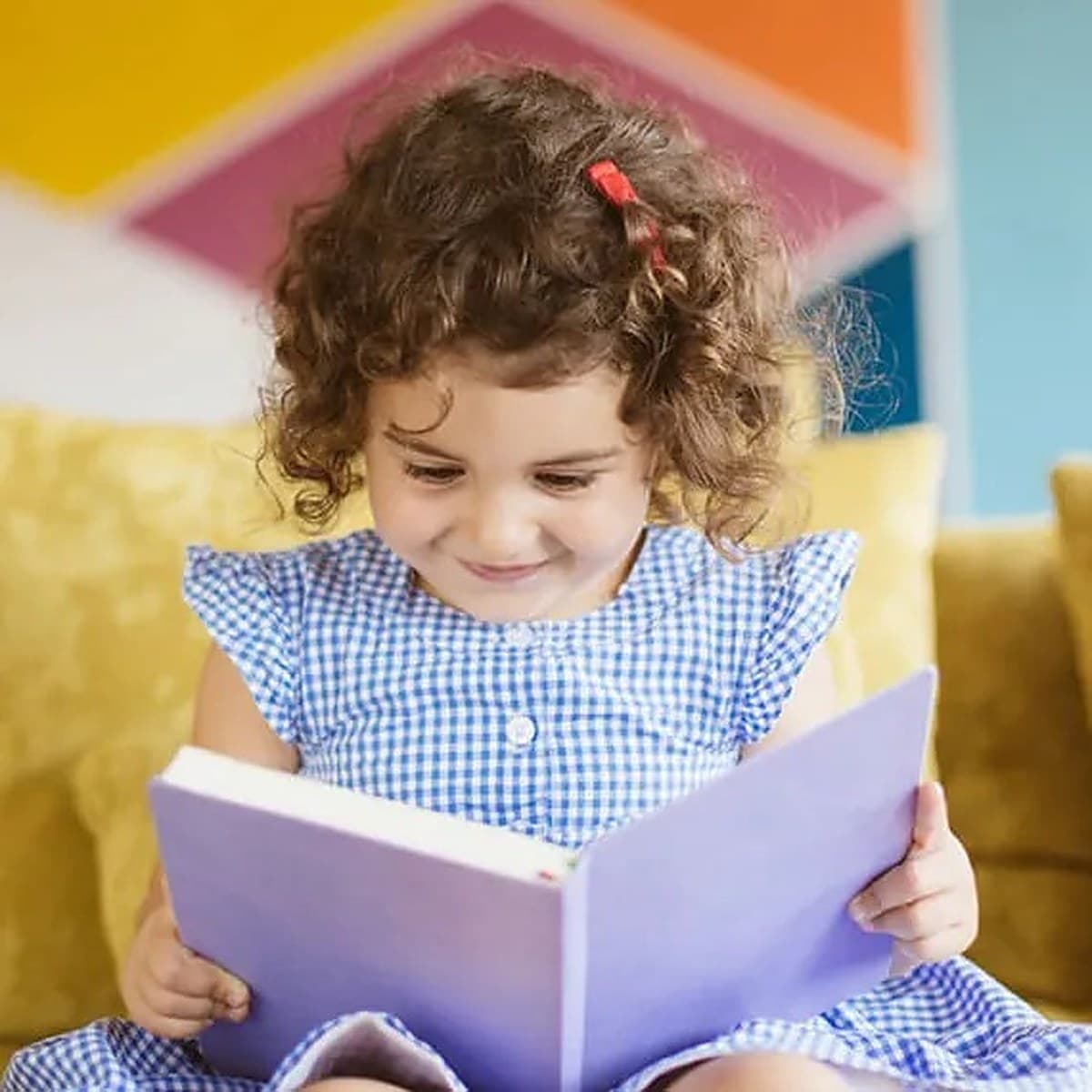 Smiling girl with curly hair